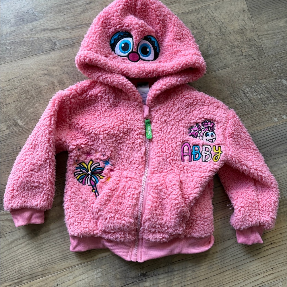 Pink Fleece Hoodie with Embroidered Designs